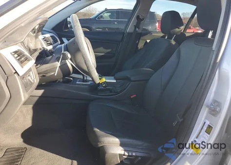 2015 BMW 320 I z USA, uszkodzony, nr VIN WBA3B1C59FK140739